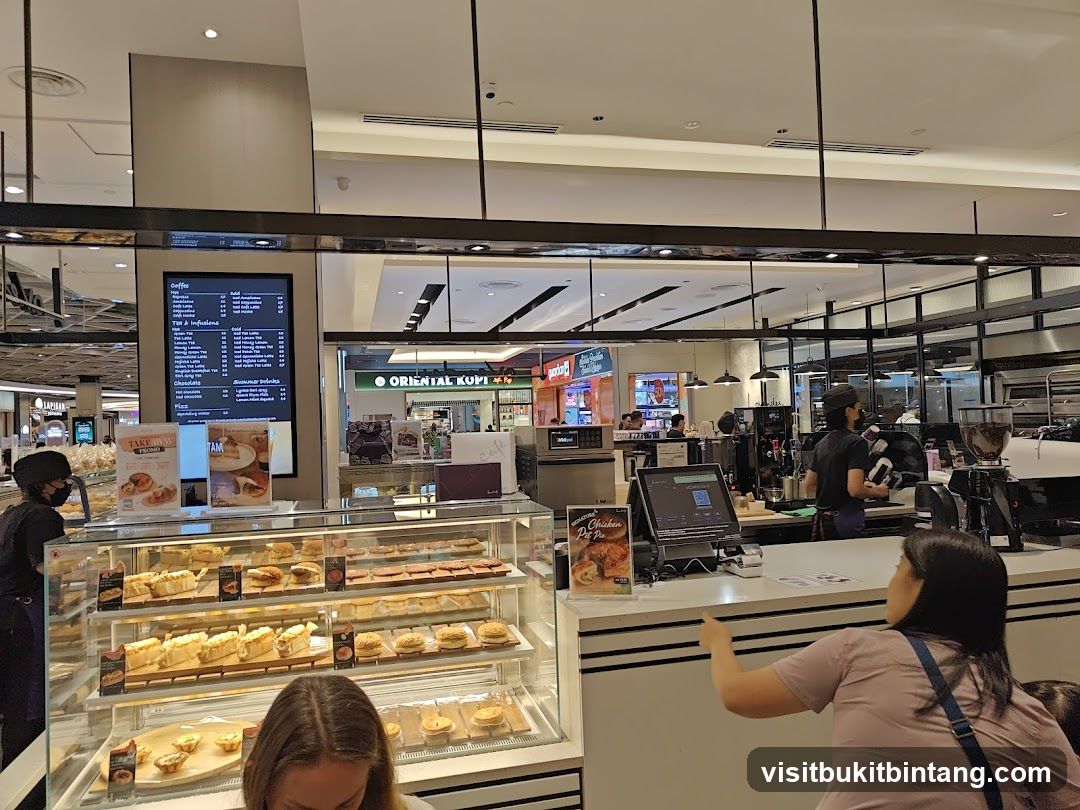Cafe Counter with Pastries and Menu
