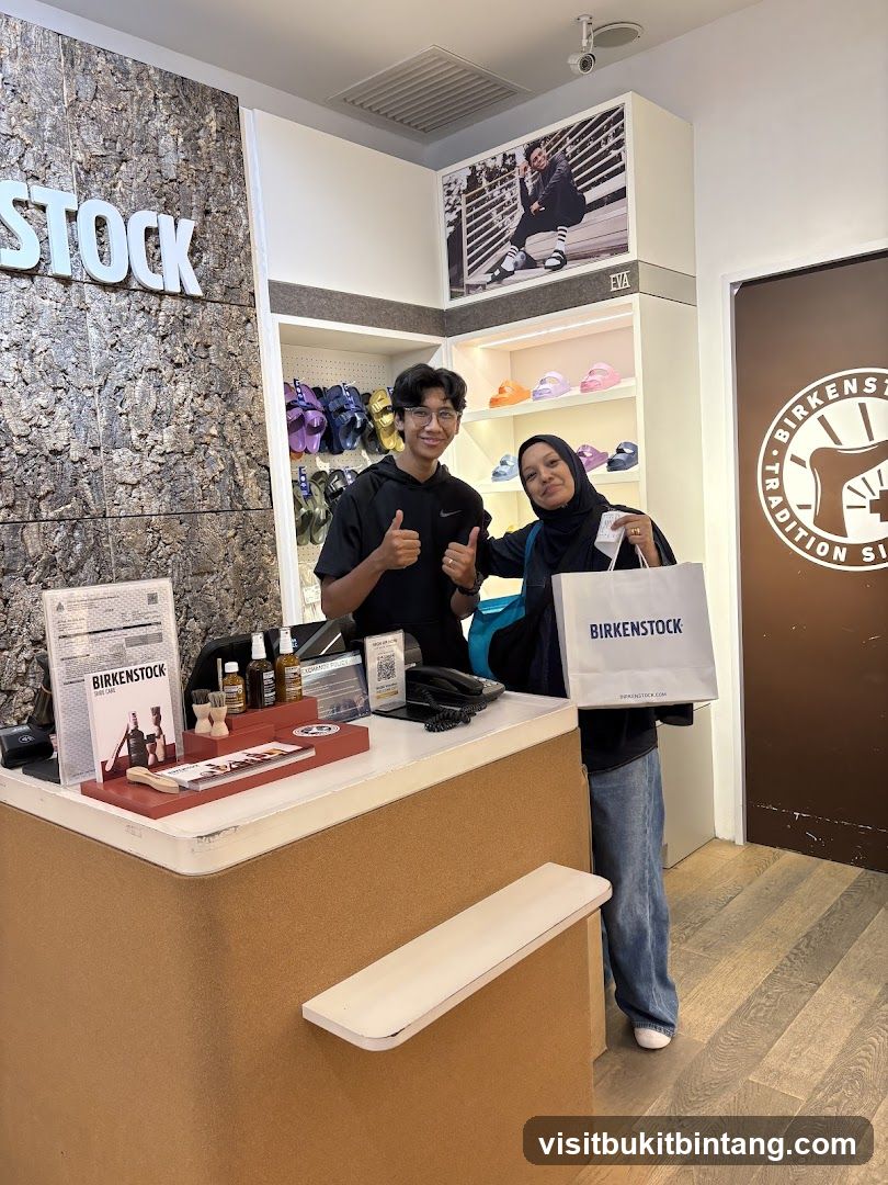 Two people at a Birkenstock store counter