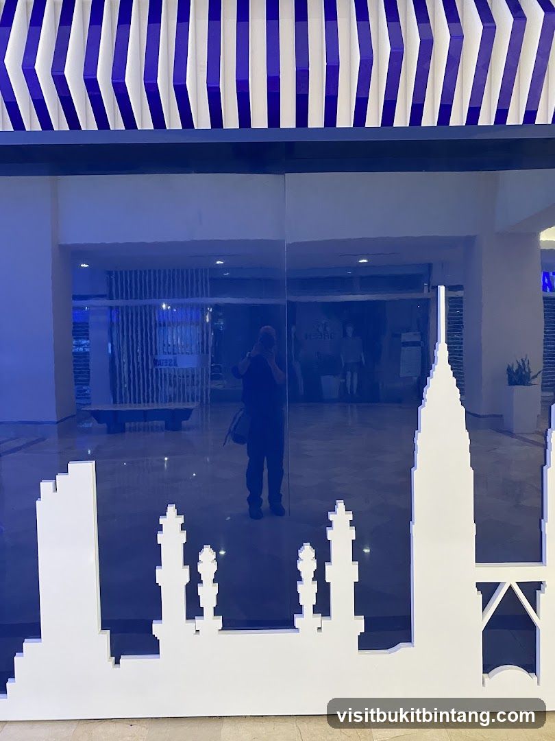 Reflective Storefront with Skyline Silhouette
