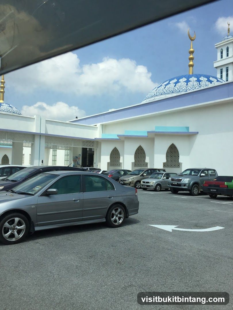 Mosque with Cars in Parking Lot