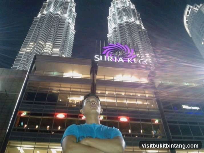 Man in front of Suria KLCC