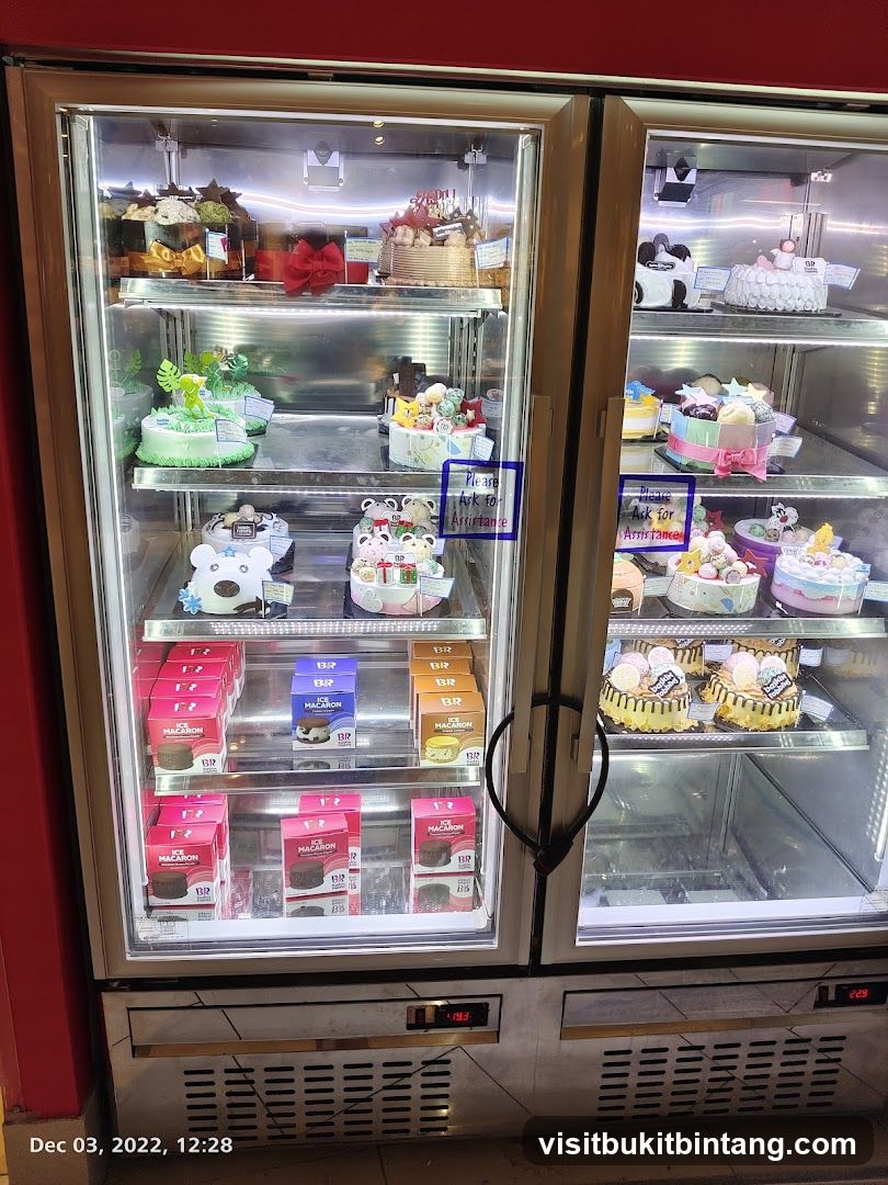 Refrigerated Display Case with Cakes and Ice Cream