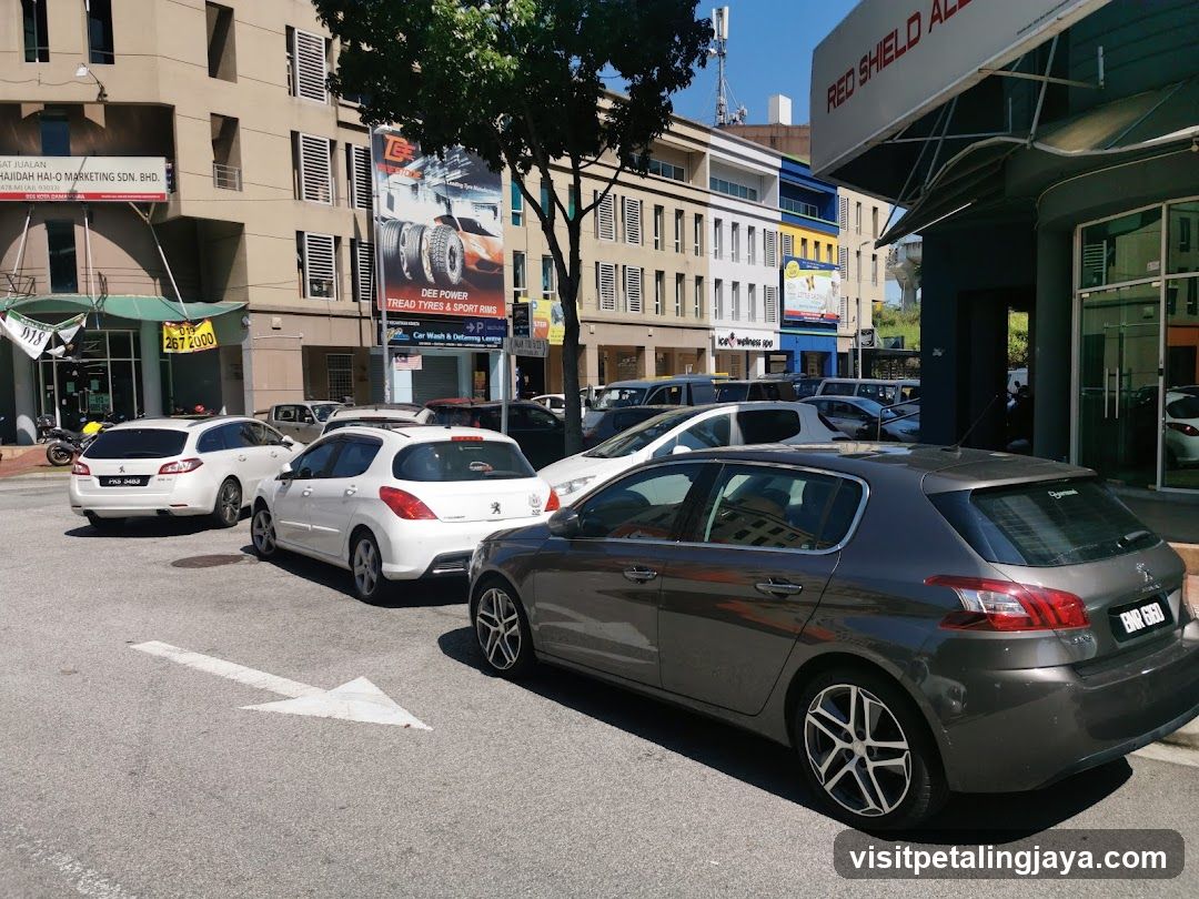 Street Scene with Parked Cars and Buildings