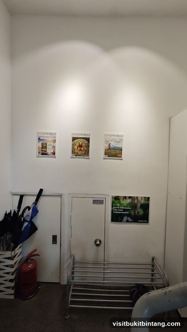 Entrance Area with Posters and Shoe Rack