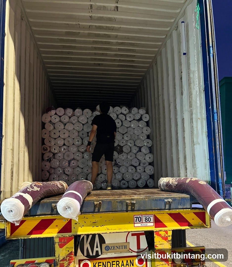 Loading Carpets into a Shipping Container