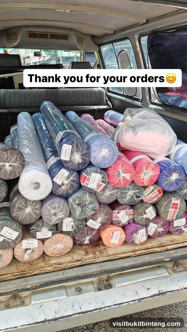 Rolls of Fabric in a Vehicle