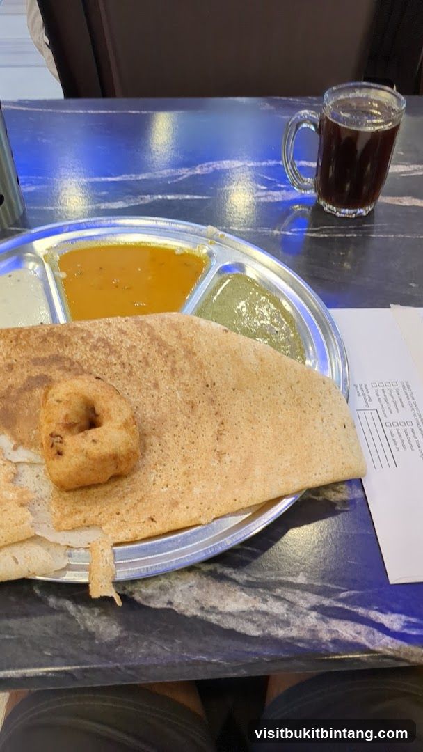 Dosa with accompaniments and tea