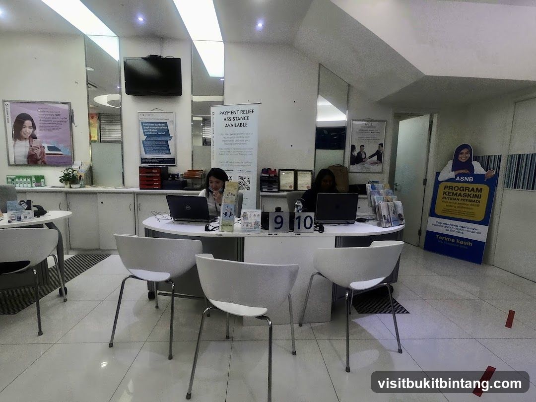 Bank interior with staff and promotional materials