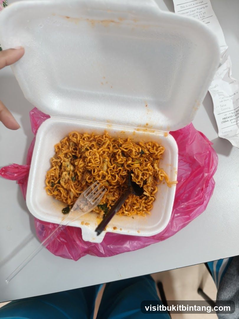Noodles in a takeout container