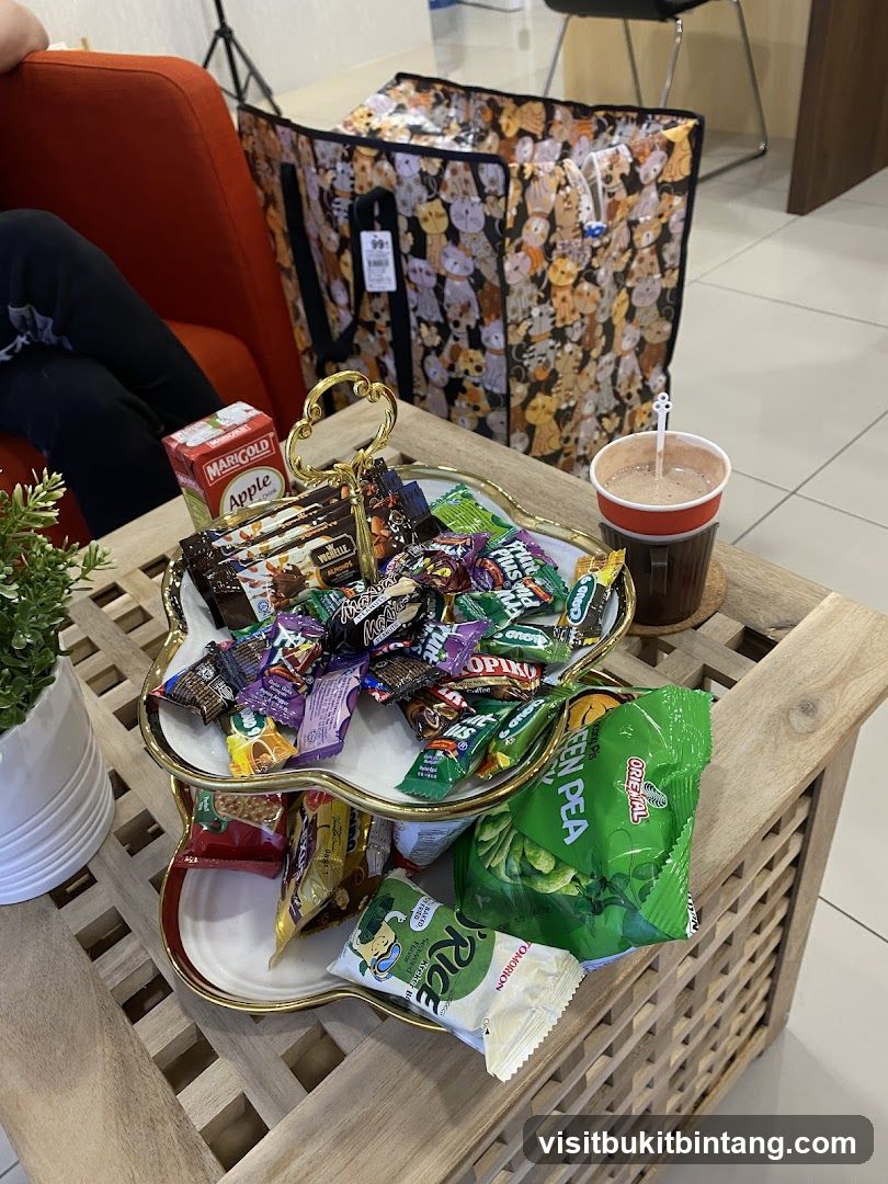 Snack Tray with Assorted Candies and Drinks
