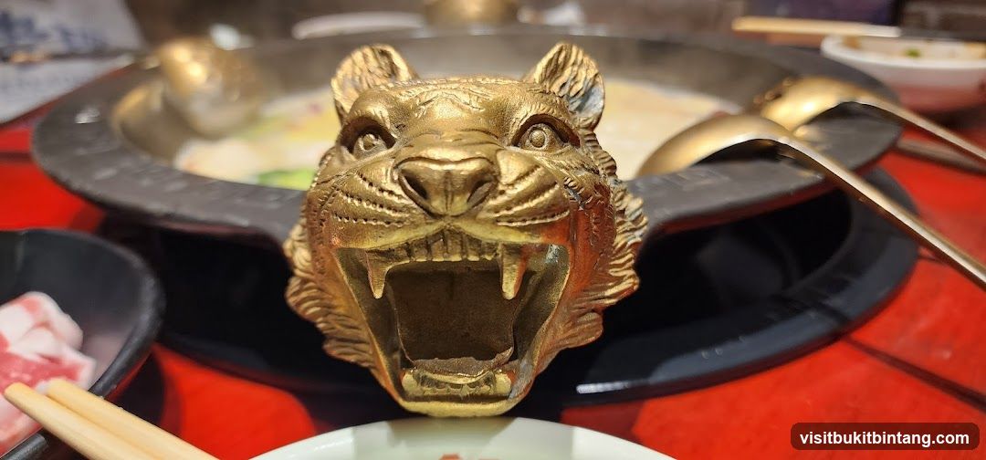 Hot Pot with Tiger Head Decoration