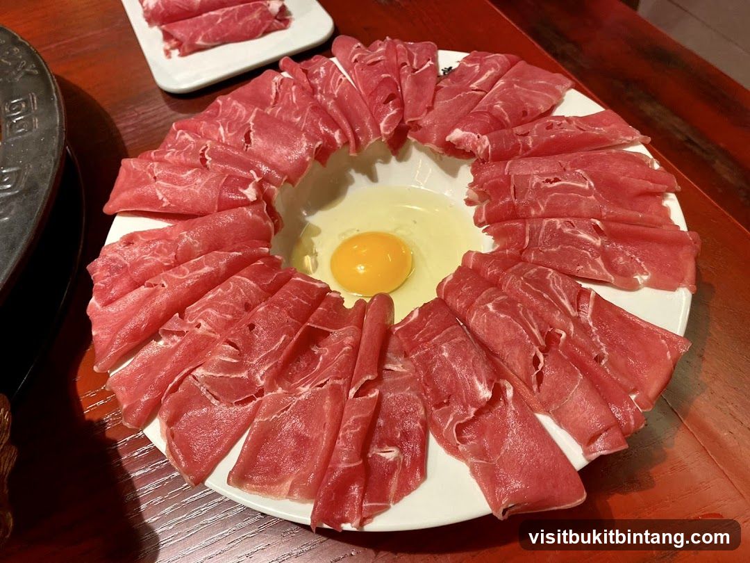 Thinly Sliced Raw Meat and Egg