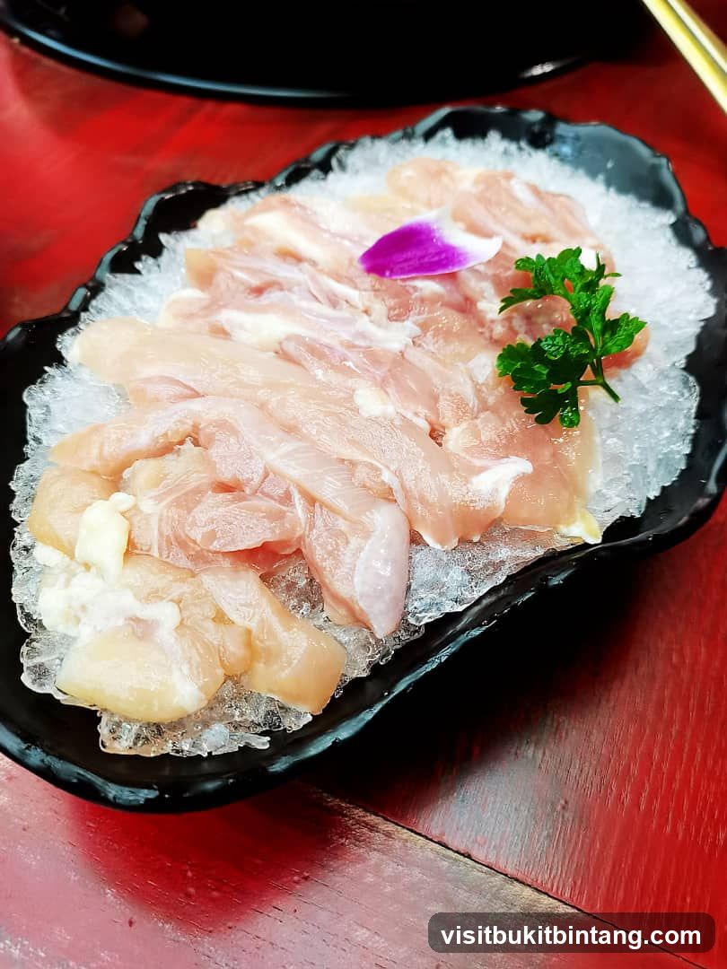 Raw Chicken Slices on Ice