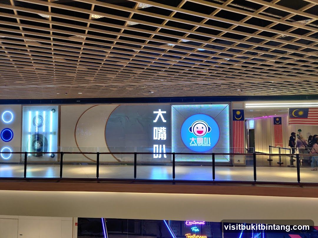 Storefront with Digital Displays and Malaysian Flags