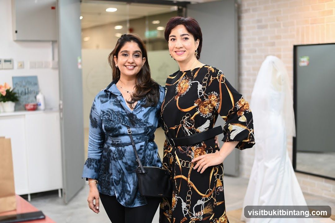 Two Women Posing in a Bridal Shop