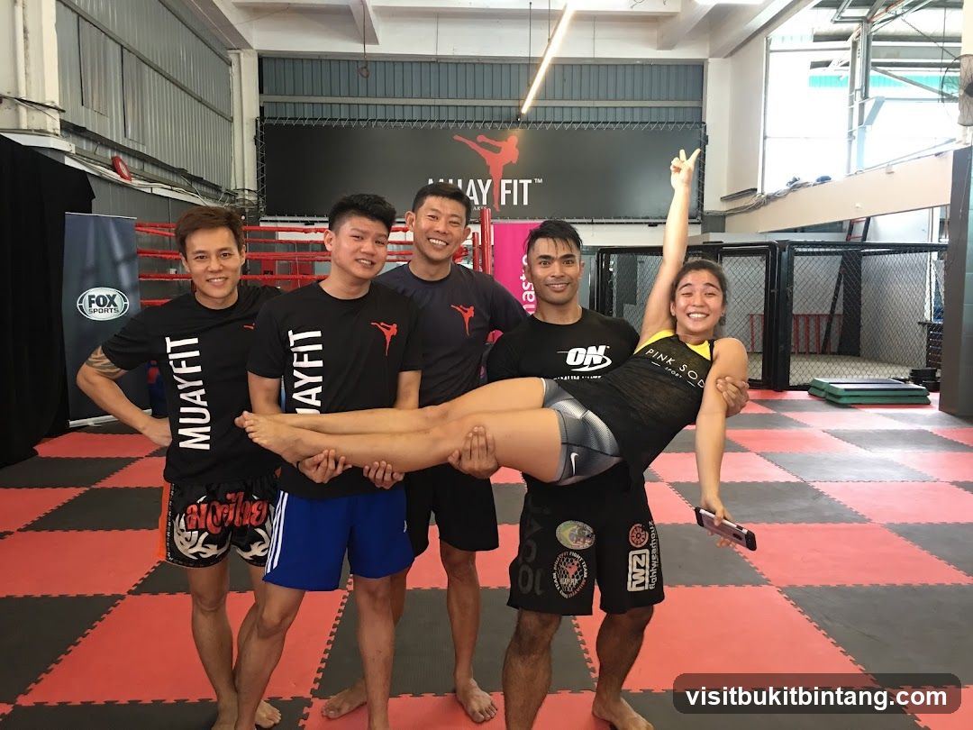 Group posing in a gym