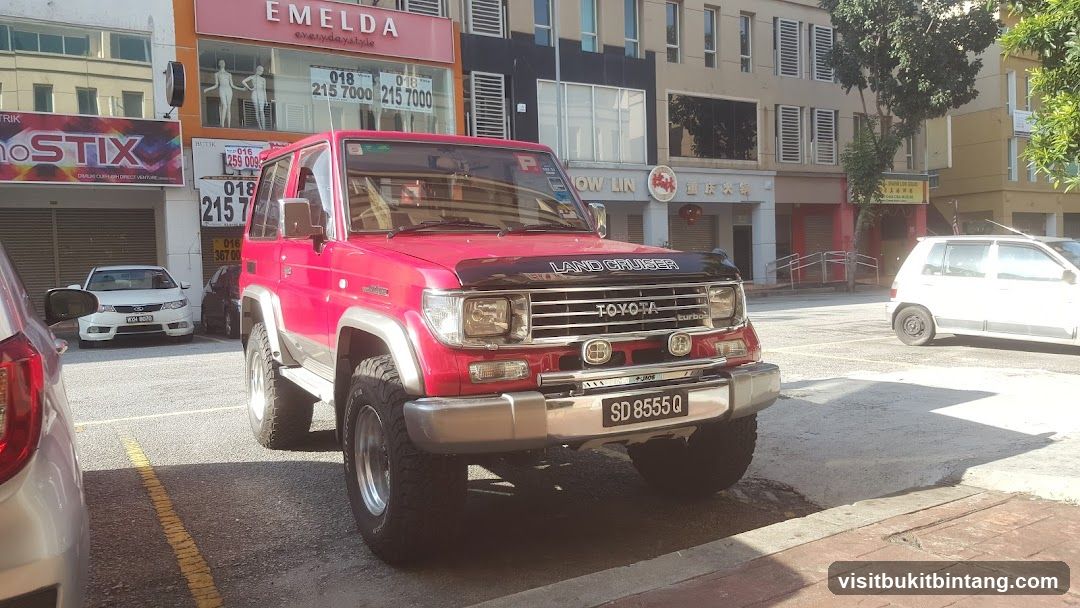 Red Toyota Land Cruiser