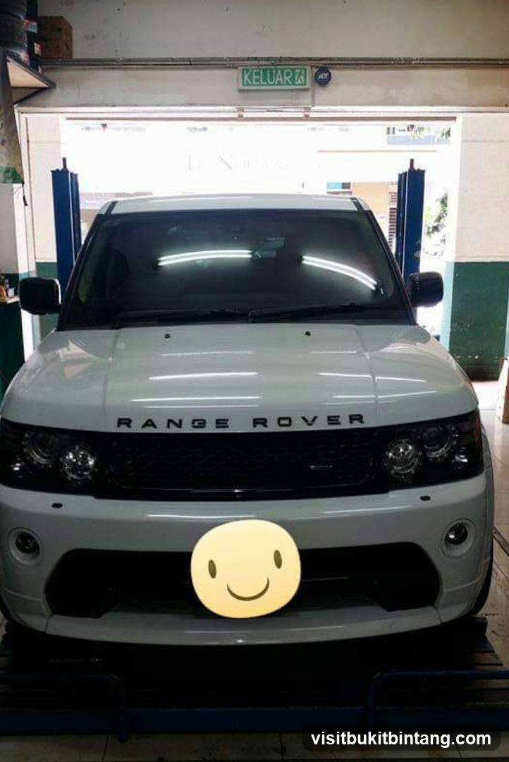 White Range Rover in a garage
