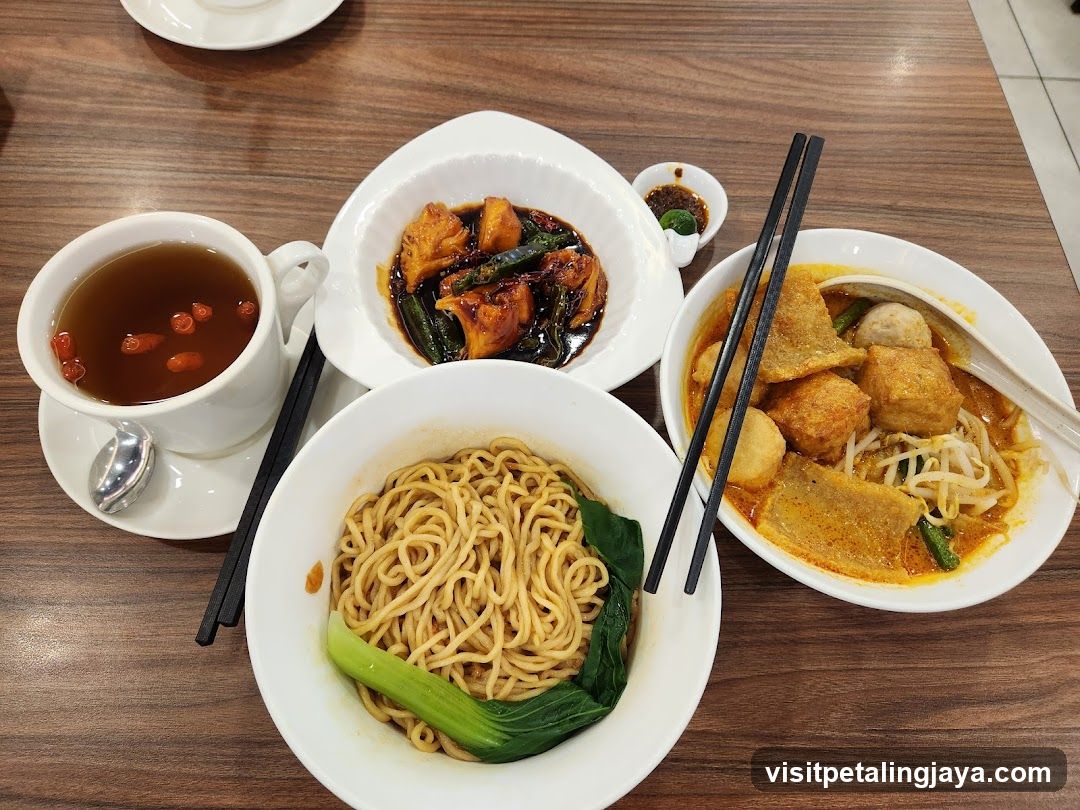 Noodle Meal with Side Dishes and Tea