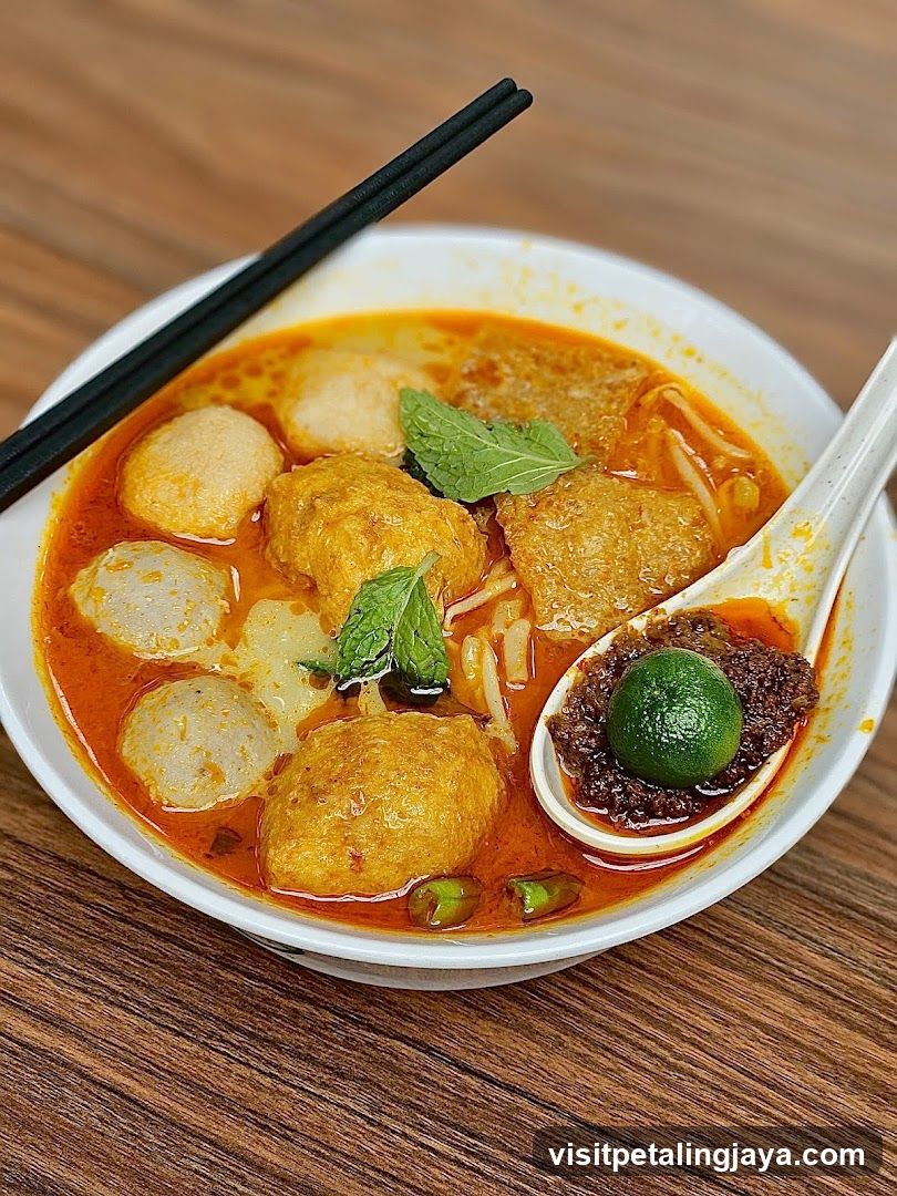 Spicy Noodle Soup with Fish Balls and Lime
