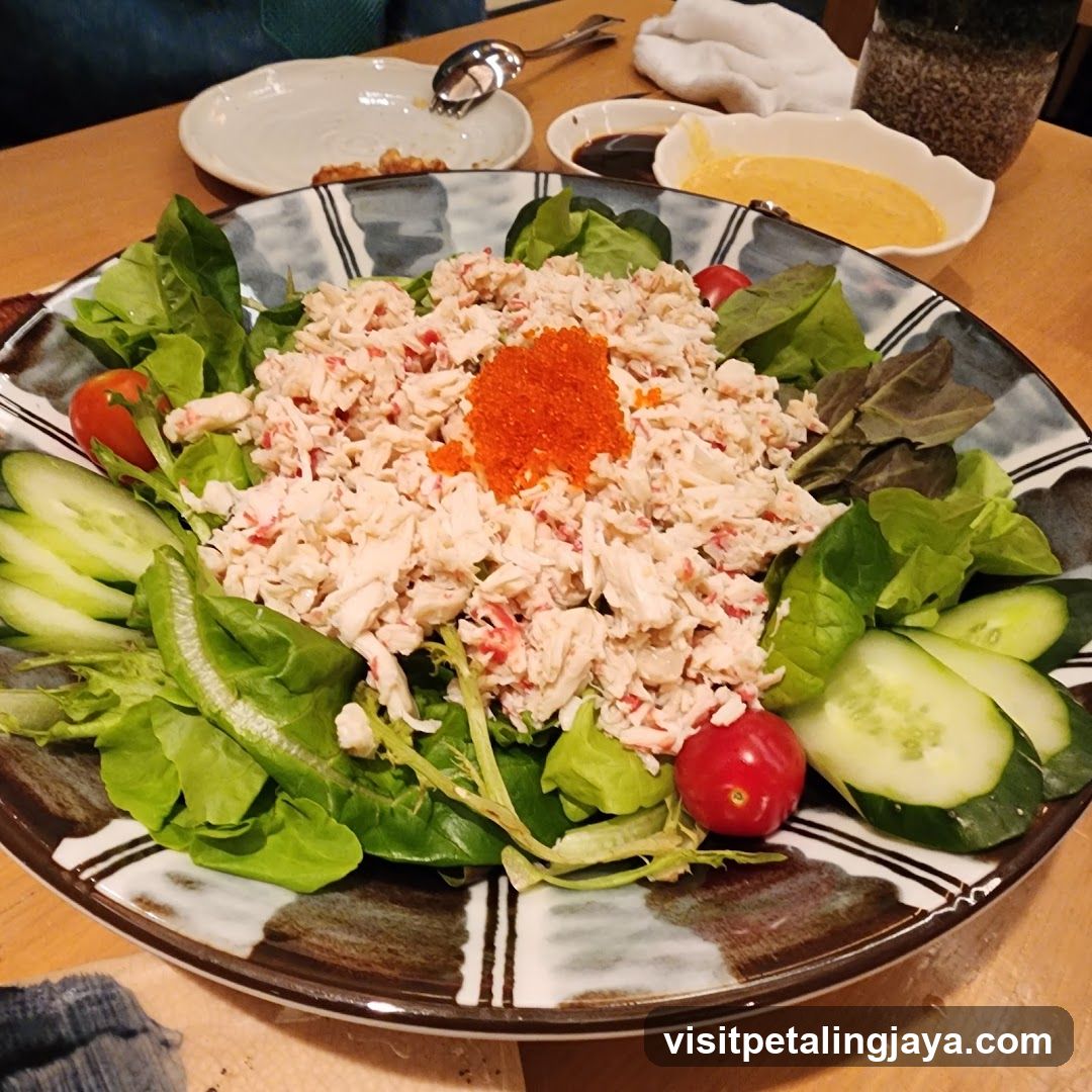 Salad with Crab Salad and Cucumber Slices