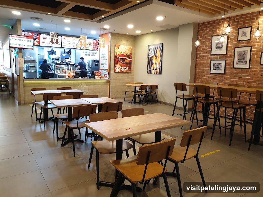 Restaurant Interior with Menu Boards and Staff