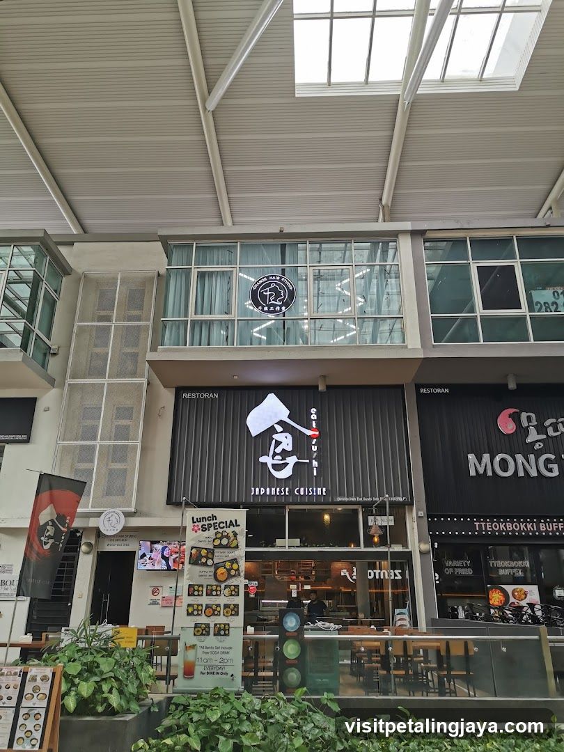 Restaurant Exterior with Signage and Menu Board