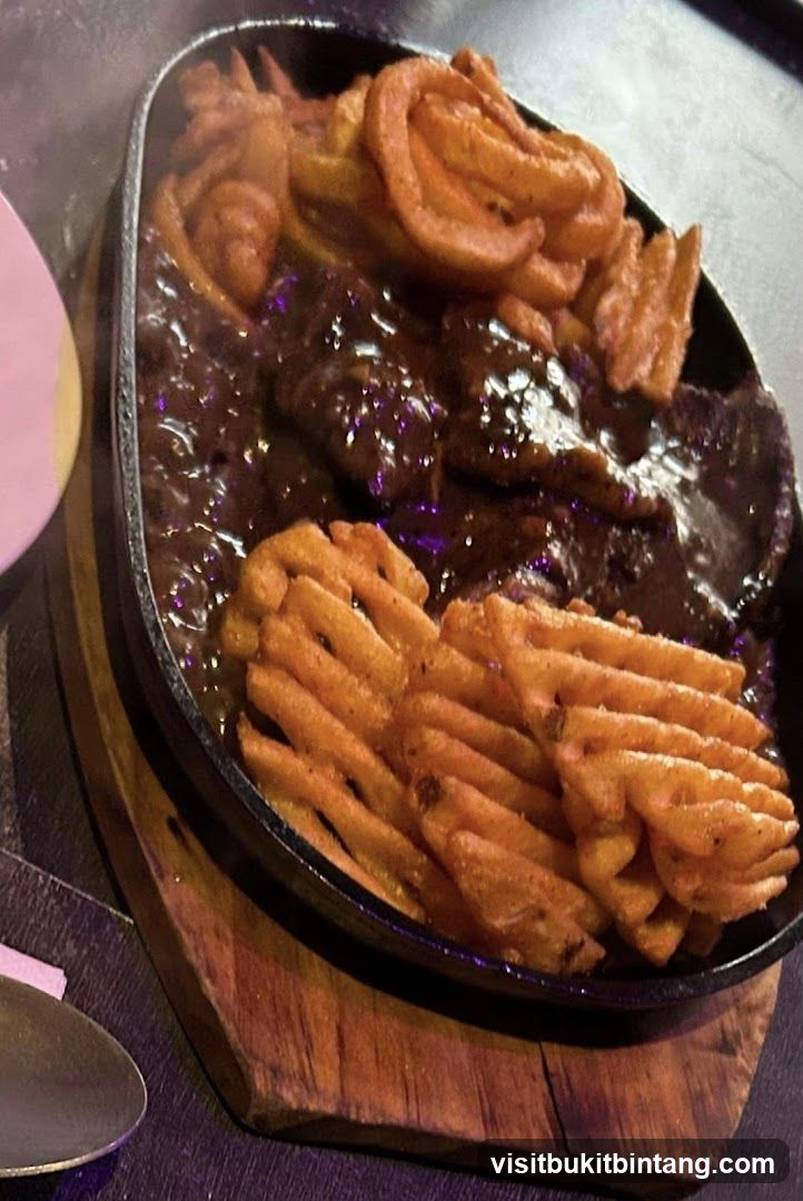 Sizzling Steak with Fries