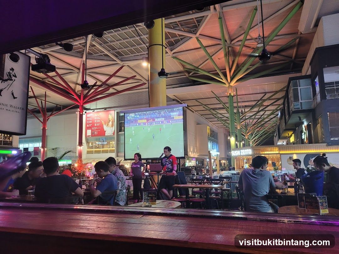 People watching a soccer match at an outdoor venue