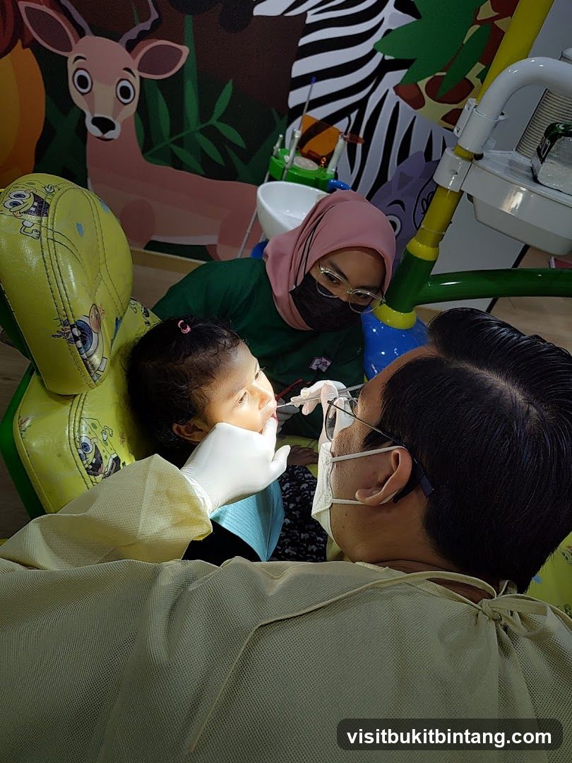 Dentist examining a child's teeth