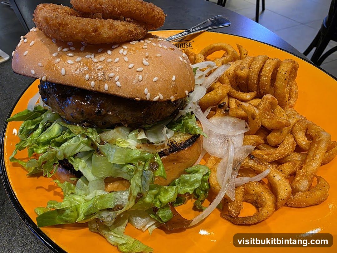 Burger with Onion Rings and Curly Fries