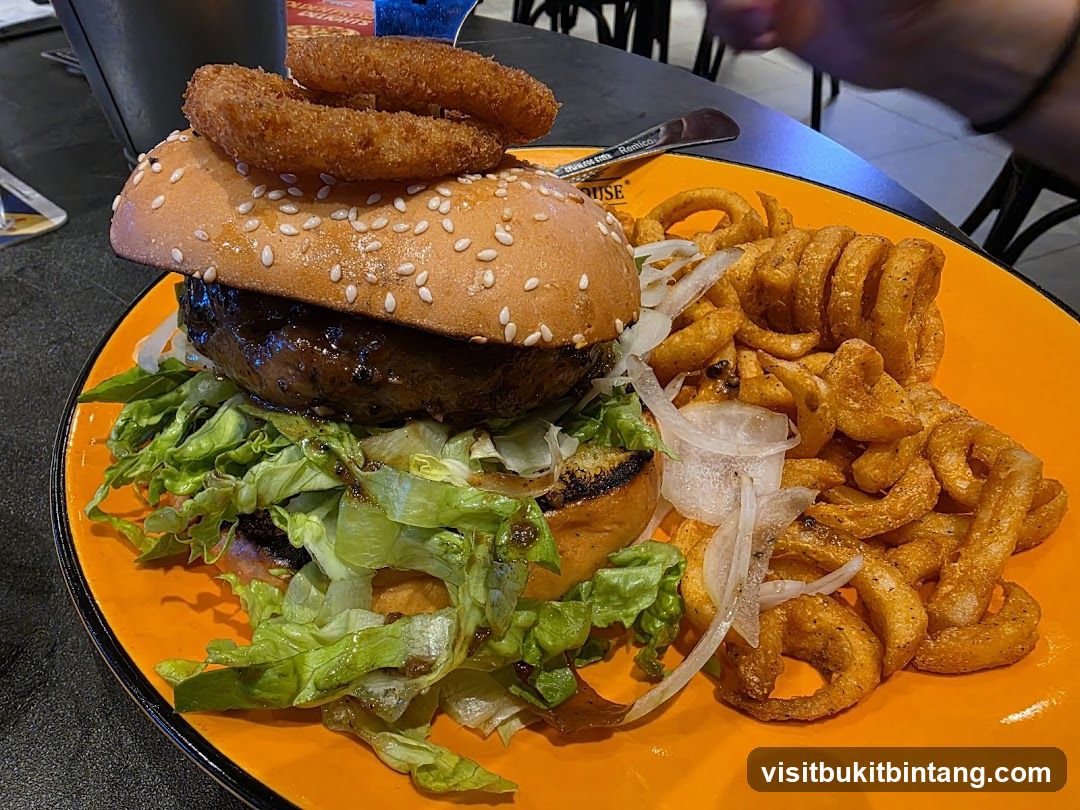 Burger with Onion Rings and Curly Fries