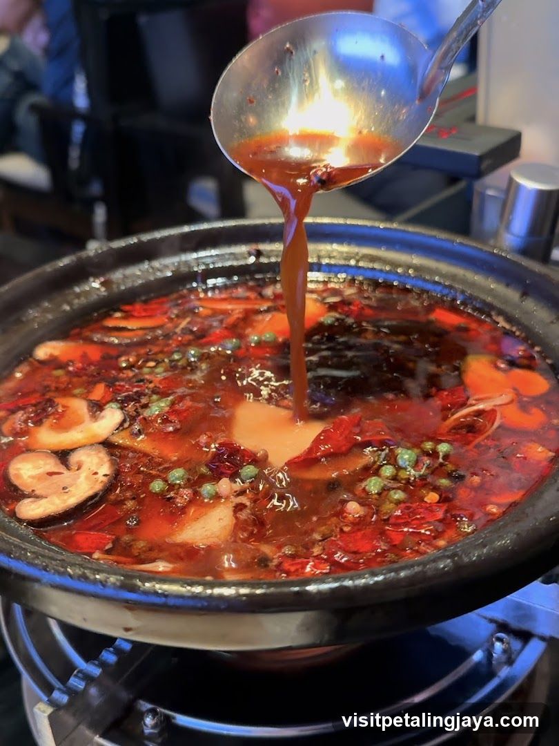 Spicy Hot Pot with Chili Oil Pouring