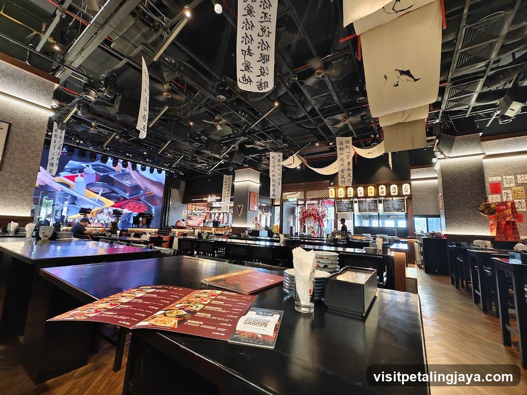 Restaurant Interior with Open Kitchen and Decorative Banners
