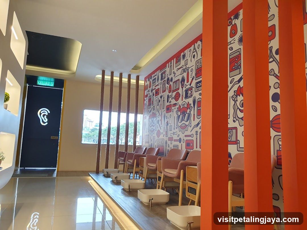 Interior of a modern waiting area with colorful wall art and seating