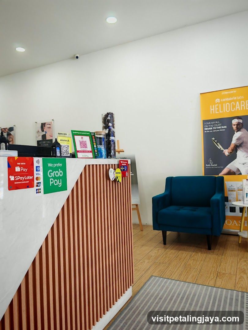 Interior Reception Area with Payment Options and Advertisements