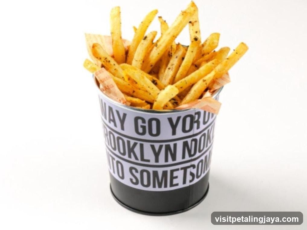 Fries in a branded tin