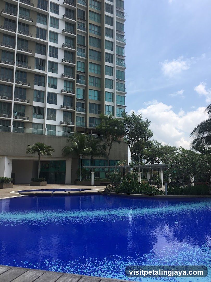 Poolside View of High-Rise Building