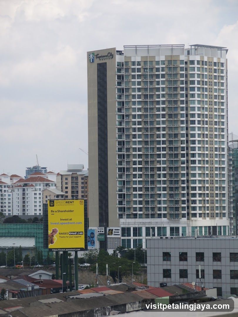 Urban skyline with high-rise building and billboard