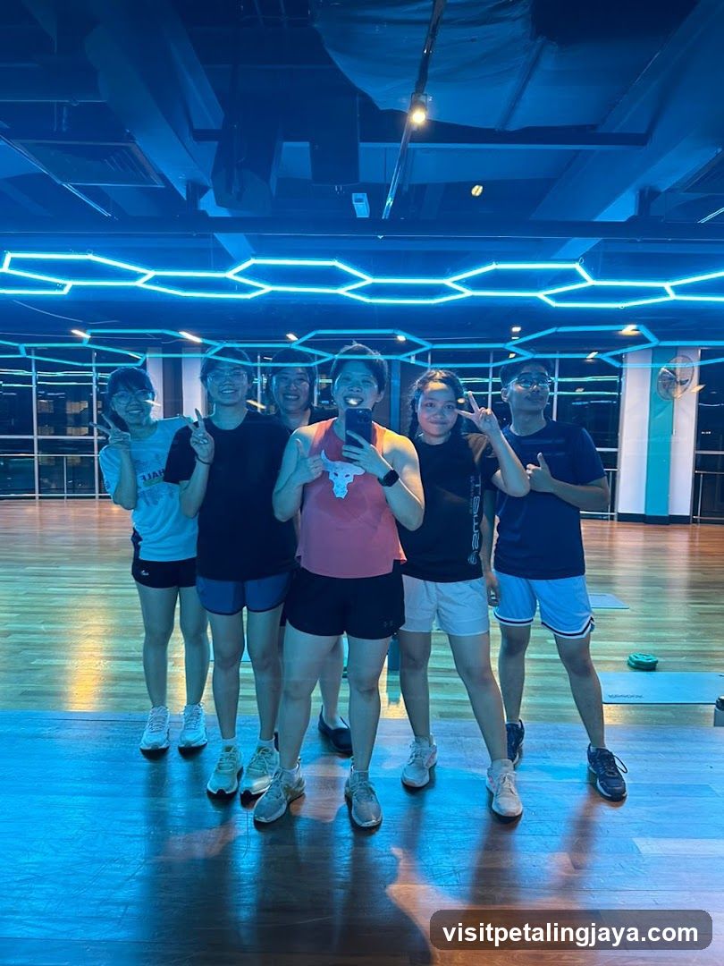 Group selfie in fitness studio