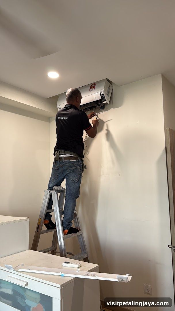 Technician Installing Air Conditioner