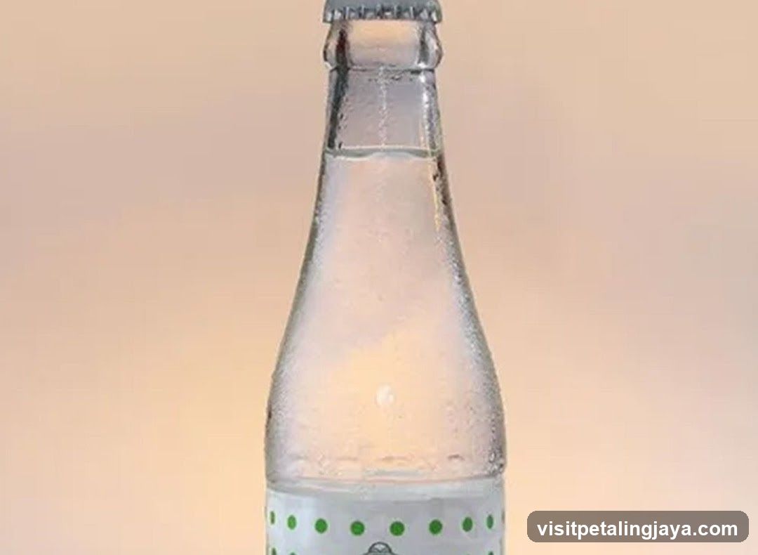 Glass Bottle with Green Dots
