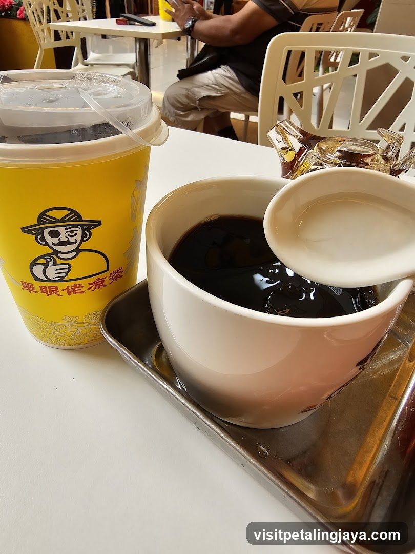 Bowl of black dessert with iced tea