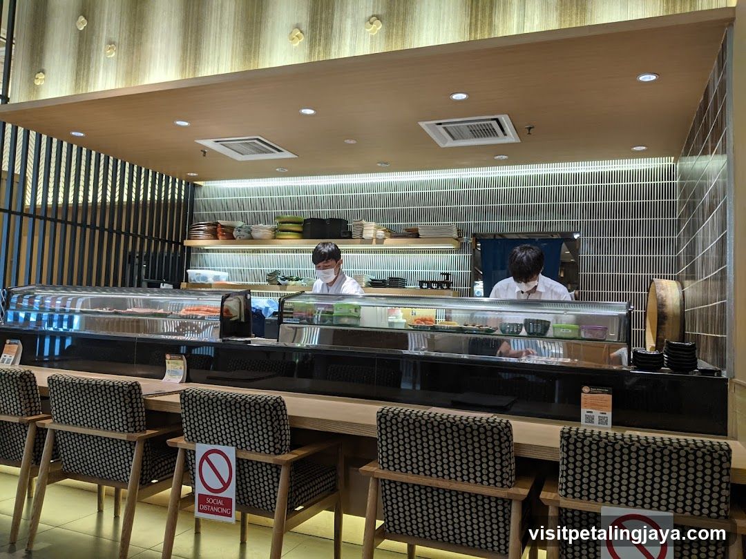 Restaurant Interior with Staff Behind Counter
