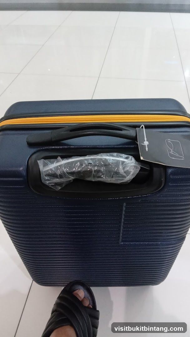 Dark Blue Suitcase with Yellow Zipper