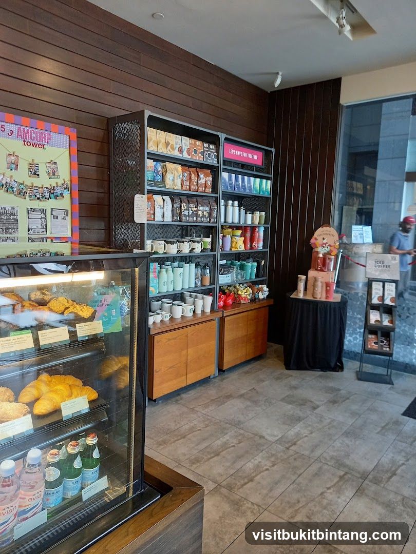 Coffee shop interior with display shelves and refrigerated case