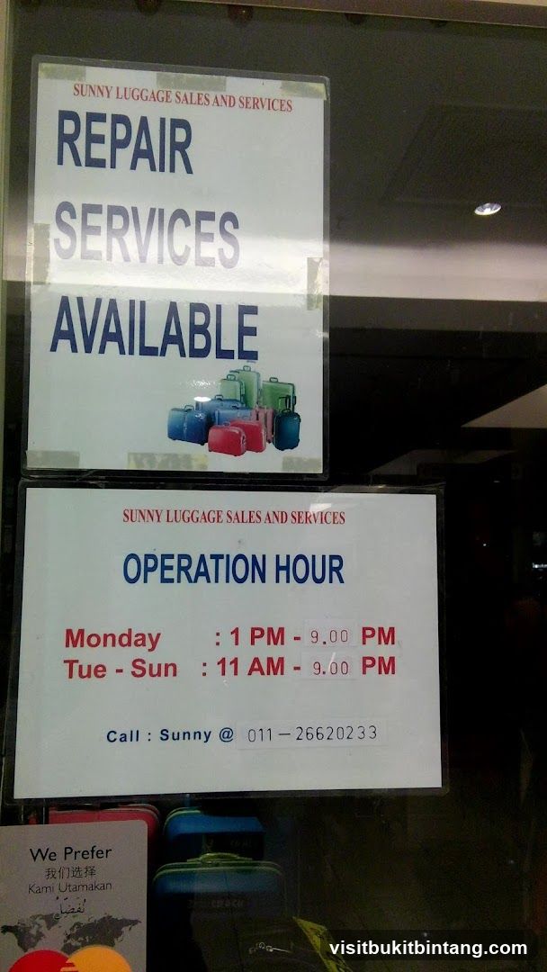 Sunny Luggage Sales and Services Signs