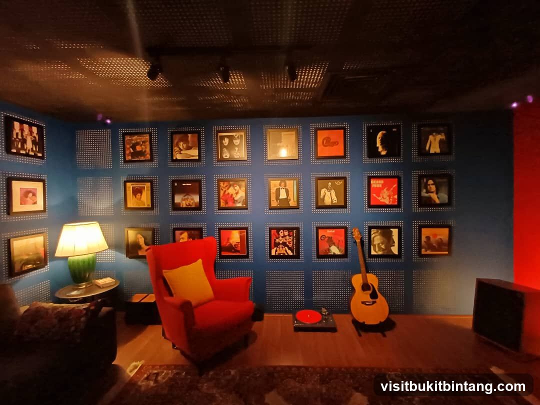 Music-themed room with framed records and guitar