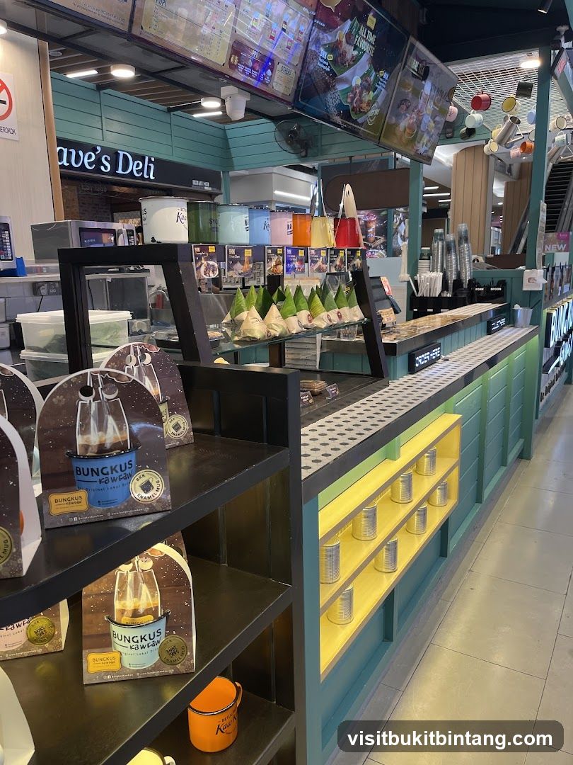 Food stall counter with packaged goods and menu boards