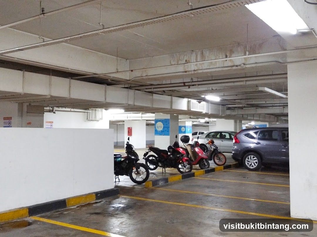 Parking Garage with Motorcycles and Cars